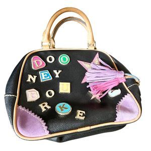 DOONEY & BOURKE specialty leather and suede bag with metal hardware